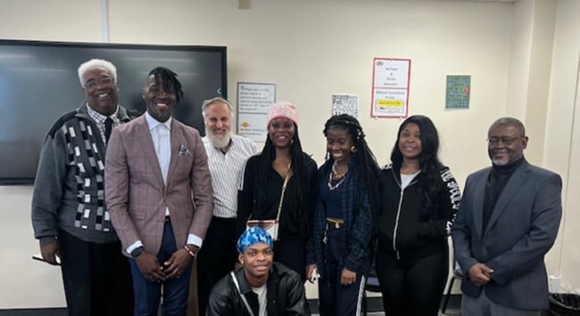 Students at South Carolina State University stand smiling with Meir Muller and Devin Randolph. 