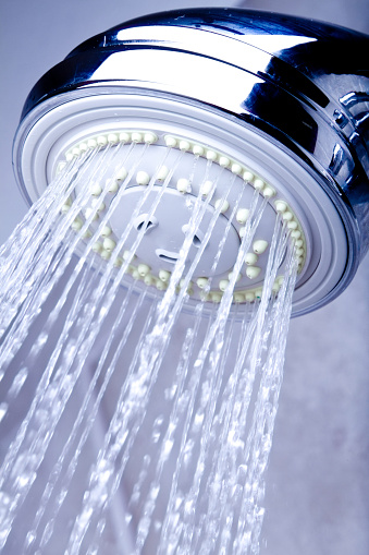 Photo of a showerhead dispensing water