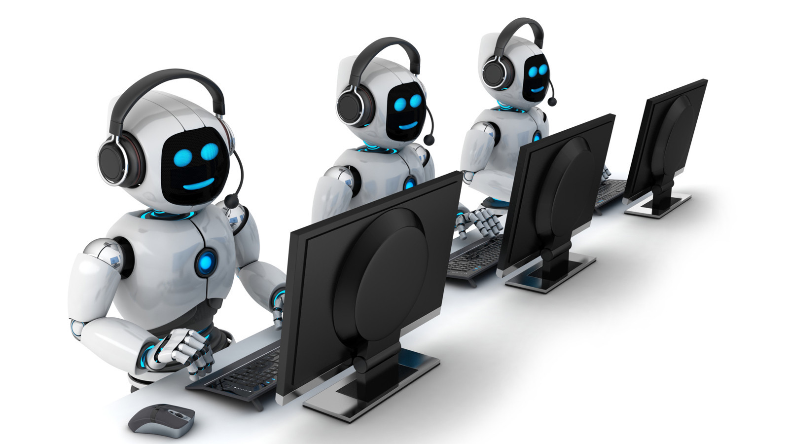 Photo of three humanoid robots sitting in front of computer screens
