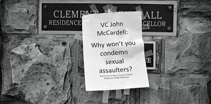 Image of a poster taped over the sign for Clement Chen Hall, the residence of the vice chancellor at Sewanee. Poster says, “VC John McCardell: Why won’t you condemn sexual assaulters? Revoke Charlie Rose’s honorary degree.”