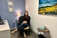 Hannah Nunez sitting in an office