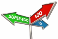 A series of three different-colored street signs, each pointing different ways, each reading, respectively, "SUPER-EGO," "EGO" AND "ID."