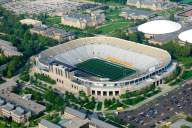 An aerial view of an empty American college football stadium.