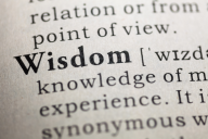 A dictionary entry for the word "wisdom." Though the full definition is not visible, words that are visible include "knowledge" and "experience."