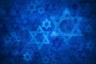 A wallpaper pattern with light blue Stars of David against a darker blue background.