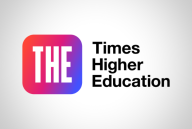 A square with rounded corners colored with a changing gradient that starts red and pink on the top left and changes to purple and blue on the bottom right. On this background are the white letters "T," "H" and "E." To the right of the rounded square, black text reads "Times Higher Education."