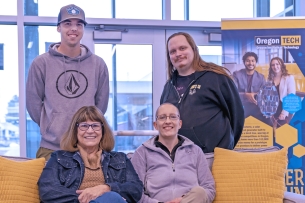 Four Oregon Institute of Technology students smile for a photo.