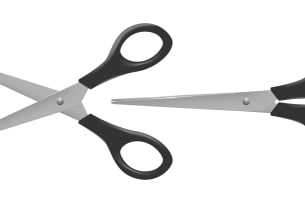 A photo of two pairs of scissors, one closed and one open, ready to cut.