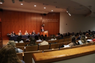 An alumni panel speaks to students.