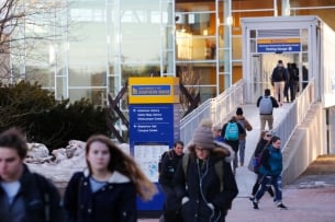 Students walking around on the campus of University of Southern Maine.