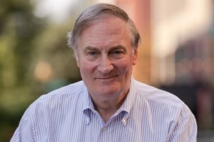 Terry Hartle, a white man with gray hair wearing a collared shirt.