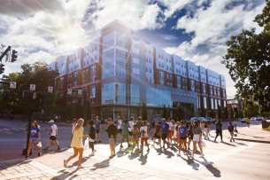 Students walk on a sunny day at the University of Kentucky.