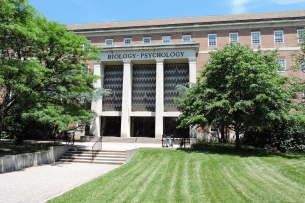 A photograph of a University of Maryland at College Park building with letters spelling "Biology - Psychology" above the entrance.