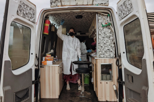 Emory University senior Alia Bly stands in the OKB Hope Foundation's mobile disease screening laboratory in Mobia, a rural community in the Ashanti region of southern Ghana.