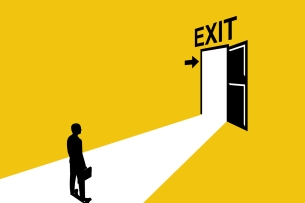Person holding briefcase stands alone before open door above which a sign reads "Exit"