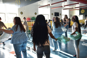 Hollins students snap dish towels, a stress-management tool.