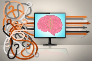A tangle of lines goes through a computer screen with a brain and dollar sign on the monitor, coming out of the monitor in all straight lines.