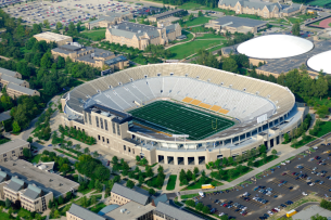 An aerial view of an empty American college football stadium.