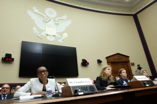 Three college presidents sit at a table while testifying before the House Education and Workforce Committee.