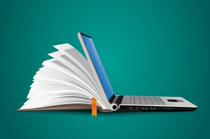 A graphic of an open laptop connected to an open book.