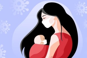 Women wearing mask holds baby in front of a backdrop of COVID illustrations