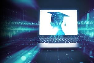 A computer screen with a silhouette wearing a graduation hat is surrounded by blue digital lines 