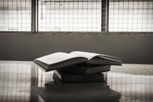 Books in a prison cell