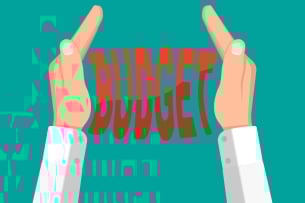 An illustration of two hands squeezing the word "budget."