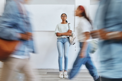 Young Woman Holding Phone Walking On Street High-Res Stock Photo - Getty  Images