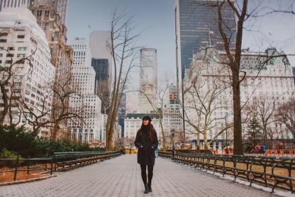 Young woman walks through Central Park in New York