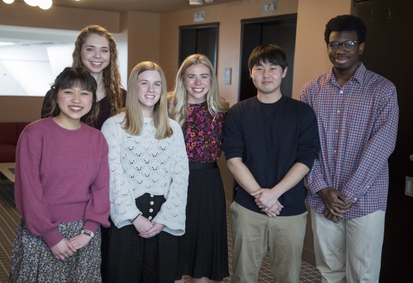 Six Hope College tuition-free program students of varying races; all are smiling.