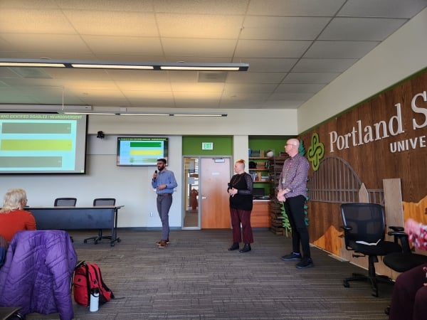 Three Portland State participants present their research. 