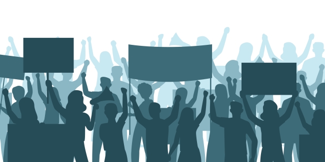 A blue silhouette drawing of a group of people holding up protest signs, engaging in activism, many with their arms raised.