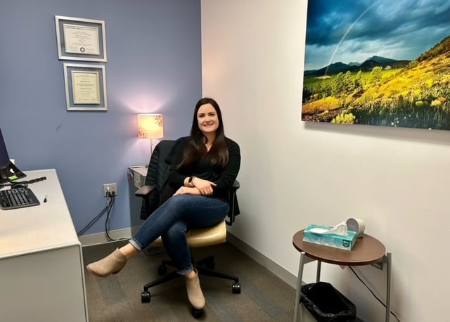 Hannah Nunez sitting in an office