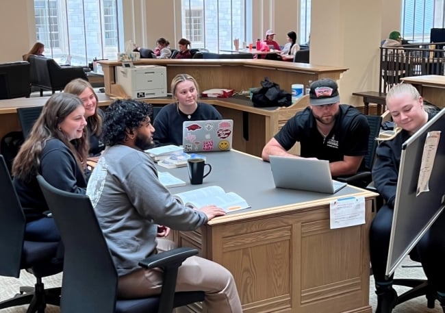 The CORD student advisory board gathers for a morning meeting.