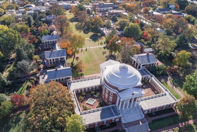 An aerial view of a green college campus, with a rotunda in the center