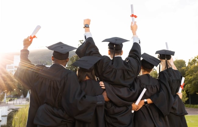 A group of graduates celebrating