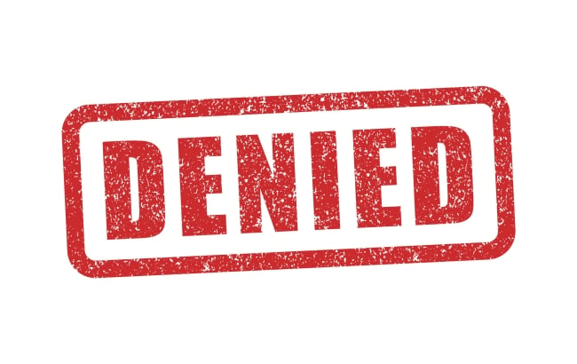 A graphic of the word "denied," stamped in red, against a white background.