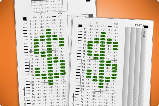 Two scantrons shaded in to show dollar signs in green