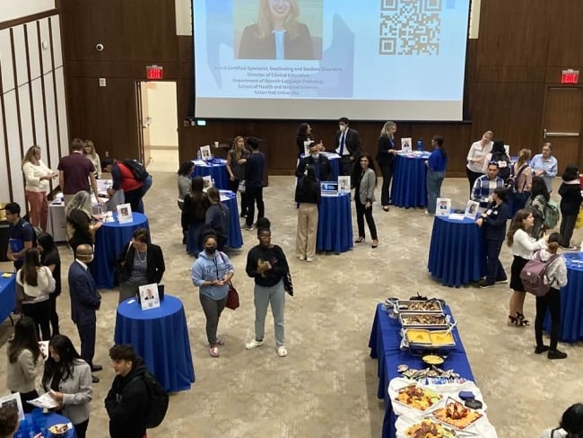 A room full of high-top tables at the 2022 Health Professions Expo at Seton Hall