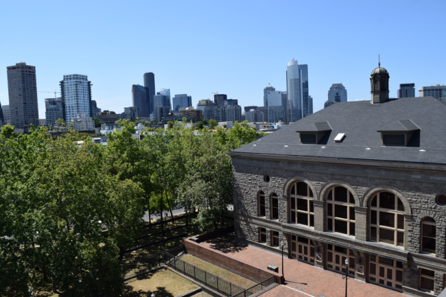 An aerial view of Seattle Central College and the Seattle skyline on a sunny day