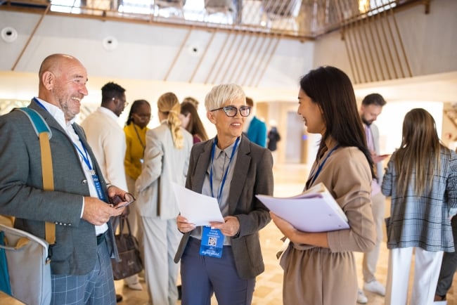 People talking in the lobby at a conference