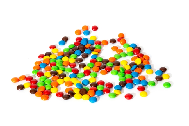 scattered pile of colorful M&Ms