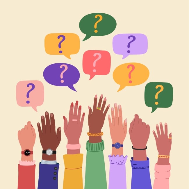 A drawing of seven raised hands with different skin colors; above their raised hands are seven speech bubbles, each with a question mark. The image is intended to convey the concept of a group of students raising their hands to ask questions.