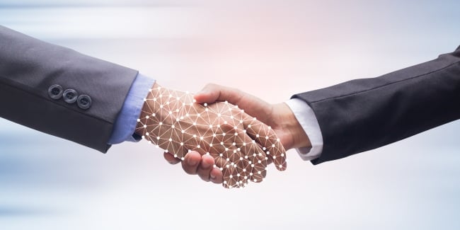 close-up businessman handshake with business artificial intelligence on motion blur background for future technology concept