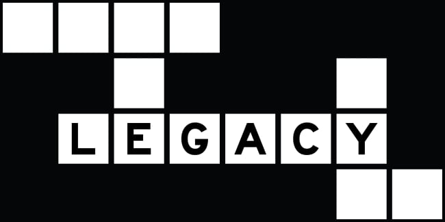 An image of a crossword puzzle with blank spaces; one line is filled out, across, reading "LEGACY."