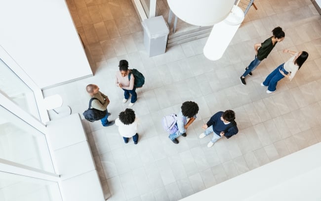 High-angle view on group of people in the large hall or lobby.