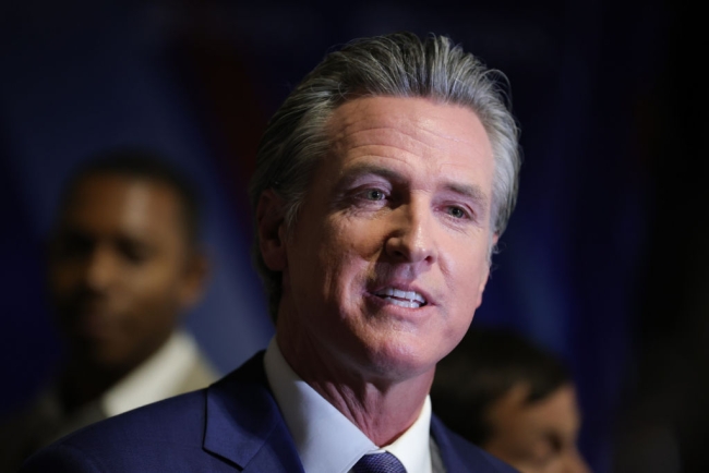 Governor Gavin Newsom, a light-skinned man with gray hair