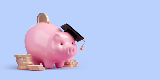 Piggy bank with graduation cap