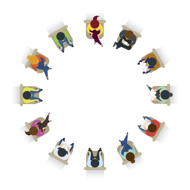 An illustration of 12 people sitting in chairs in a circle.